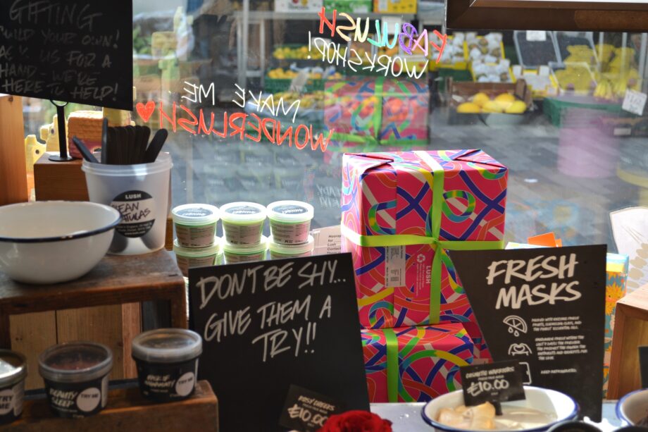 image of Lush's bath bombs and shower gels inside their store in Kingston