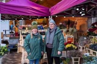 Ladies in front of flower stall